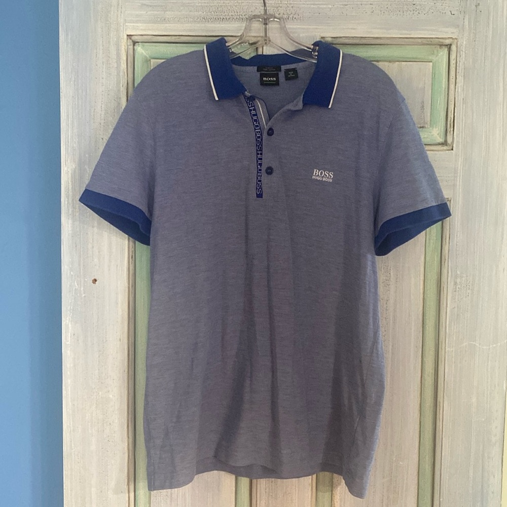 Hugo Boss New without tags, collared shirt, XL. Beautiful blue color golf shirt